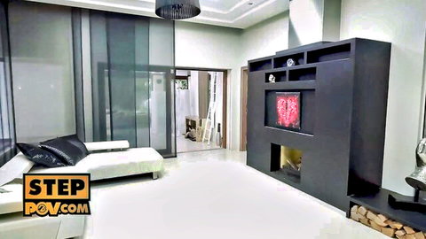Empty luxurious living room with white chaise lounge black pillows fireplace and stepov.com watermark