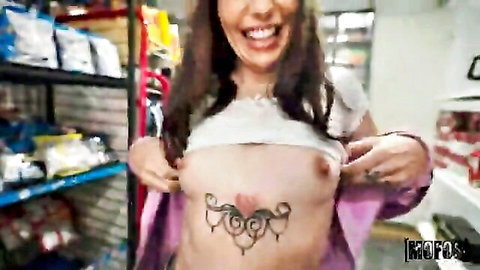 Brenna McKenna flashing tits in grocery store, topless smile
