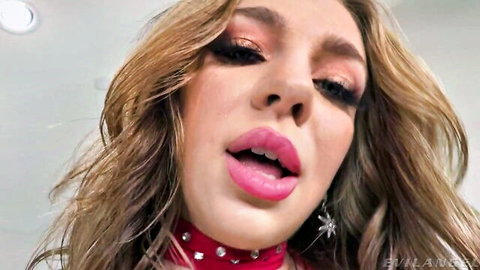 Blonde bikini babe with open mouth and choker in seductive close-up from Evil Angel cumshot video
