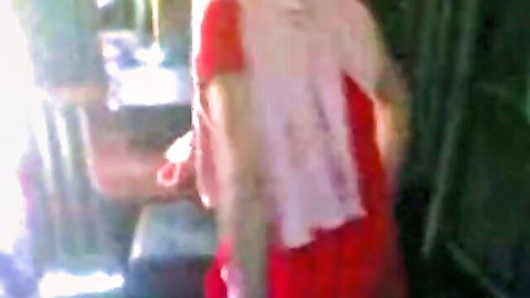 Amateur Indian brunette in red saree bending over in bus teasing curves