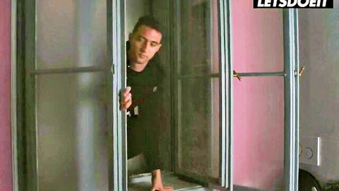 Sneaky man peeking through steamy glass shower door spying inside