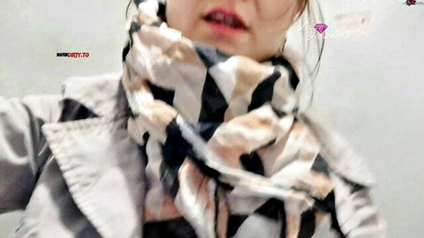Kitty_Lou close-up tease in gray coat and patterned scarf, red lips parted