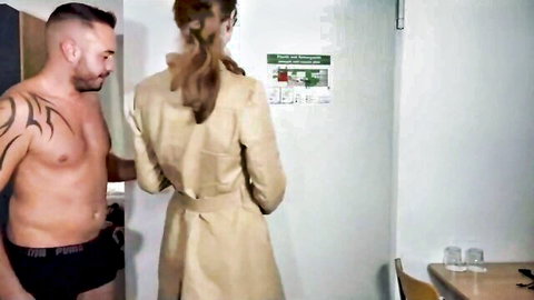 Skinny TS in trench coat teased by muscular tattooed stud in underwear