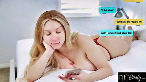 Skylar Vox big tits blonde lying nude on bed reading horny texts