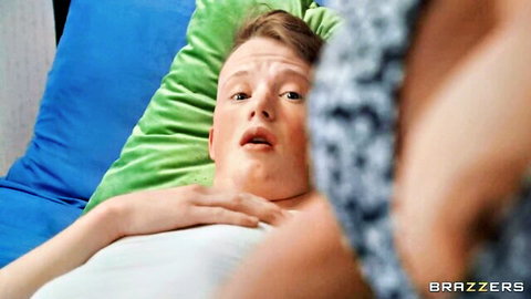 Aroused stepmom seduces surprised redhead stepson on bed