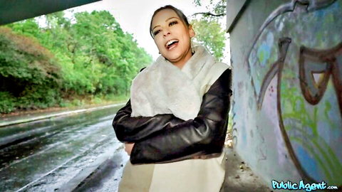 Bella Rico smiling in sexy leather jacket for Public Agent pickup