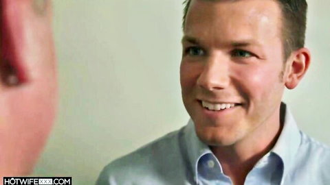 Handsome smiling Caucasian man in light blue shirt closeup portrait