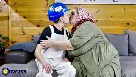 Mature Jana kissing young Petr the Boy in hard hat and overalls