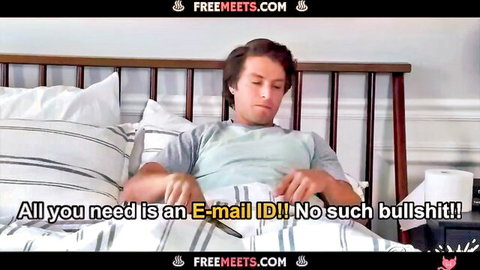 Man sitting on bed in light shirt holding small object with freemeets.com promo text overlay
