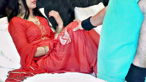 Priya in red desi dress shares romantic touch with Jija on bed