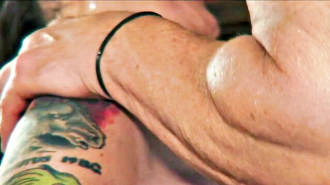Bethany gripped by tattooed arm of younger lover in passionate Vivid scene