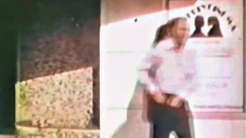 Retro couple embracing in vintage Danish XXX scene, eternal lust tease