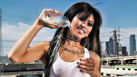 Krissie Dee in wet t-shirt pouring water over her curves outdoors