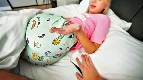Blonde Jenny Lux teasing in cute fruit pajamas on bed with hand caress