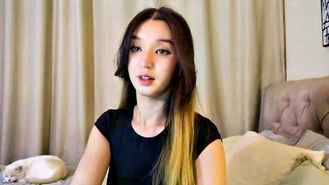 Sarasuo Asian webcam girl in black top, smiling on Chaturbate
