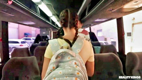 Teen with braids in daisy backpack walks toward redhead guy on bus, cheating scene preview