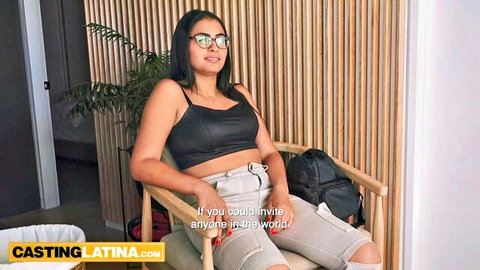 Sexy Latina casting babe in tight gray shorts and black crop top spreading legs teasing