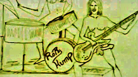 Nude blonde with big tits strumming guitar between spread legs on Rob Hump band stage