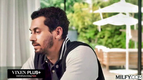 Handsome curly-haired man in varsity jacket from Vixen mother-son orgy video