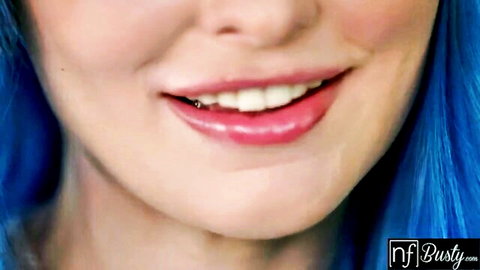 Jewelz Blu blue-haired stunner smiling with glossy lips, NF Busty