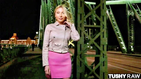 Sexy blonde model Stacy in pink skirt and jacket on bridge, Tushy Raw