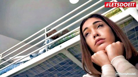 Ginebra Bellucci seductive closeup in bunk bed, hands on chin