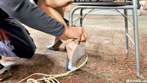 Lenna Ross in high heels, bound ankles in erotic BDSM tease