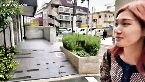 20yo Japanese student beauty with red hair on urban street