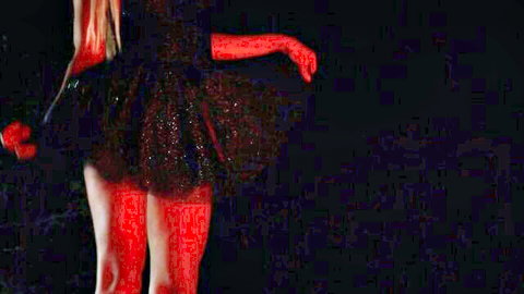 Skinny blonde in short tutu skirt exposes shaved pussy and red spanked ass from behind