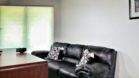 Empty black leather casting couch setup with camera ready for amateur teen fuck auditions