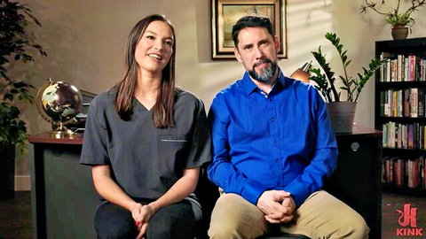 Katrina Colt as nurse in BDSM submission scene with bearded man