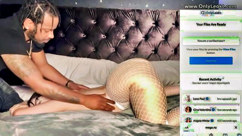 Black man gropes Gigi's big ass in gold fishnet bodysuit on bed