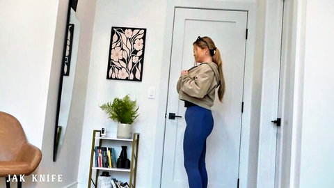 Angie Faith teasing in tight blue leggings and crop top, big ass view