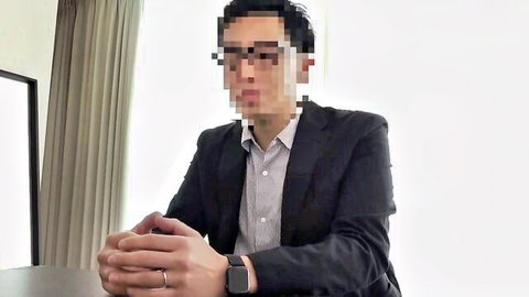 Pixelated Asian man in suit, serious expression, JAV cuckold investigation thumbnail