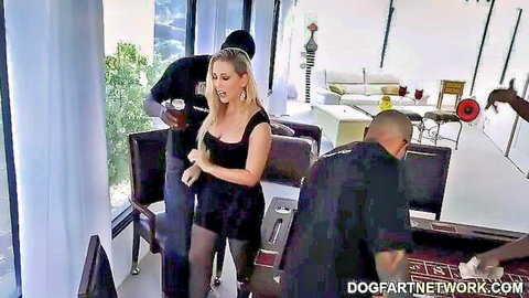 Cherie DeVille in tight black dress surrounded by black men gangbang