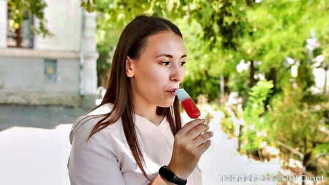 Sexy babe sucks red popsicle like cock outdoors teasing blowjob