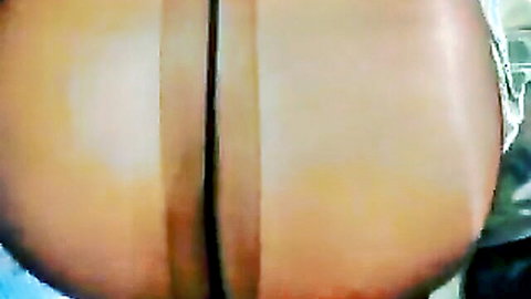 Close-up of curvy white woman's big ass with hose insertion in amateur fetish scene