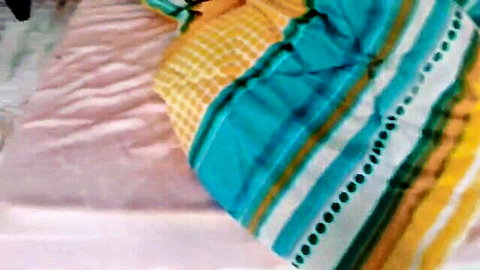 Cozy bedroom with colorful bedding and curious dog in amateur wife video