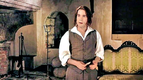 Miriam Giovanelli in Dracula 3D - man in historical vest and shirt holding item