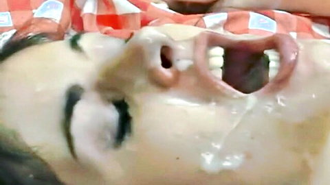 Lucie Lee with cum dripping from open mouth after DP gangbang