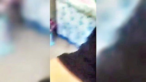 Blurry hijab mom in pink top with stepson in intimate scene