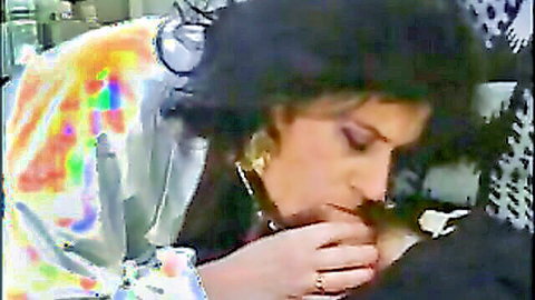 Mature Italian woman giving blowjob in car interior
