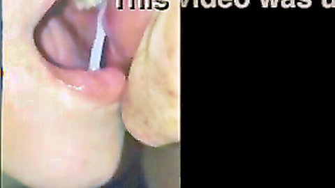 Stacey close-up with mouth full in oral tease