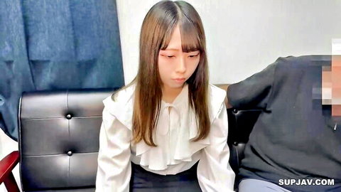 Cute 19yo Japanese Ena in frilly blouse and skirt on couch