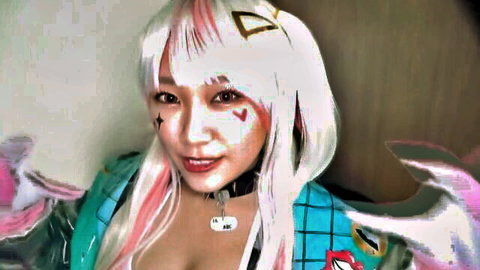 Busty Asian cosplay girl with pink hair teases deep cleavage in open blue jacket