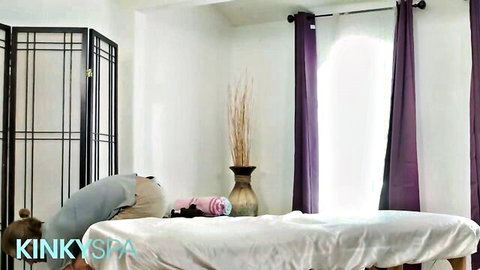 Curvy brunette with big ass bent over massage table in kinky spa room