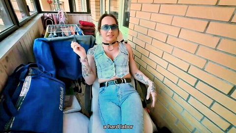 Eva Borisova trans girl posing sexy on public balcony in jeans and choker