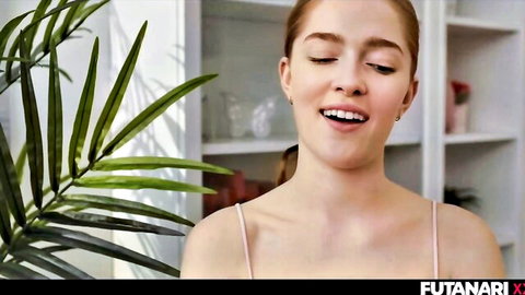 Jia Lissa redhead smiling seductively in pink camisole top
