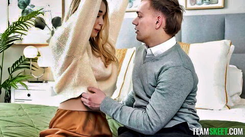Chloe Temple lifts sweater, intimate touch from partner on bed