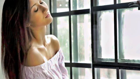 Sensual Darcee Lee in off-shoulder top, relaxing pose